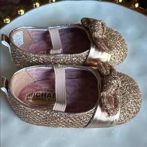 Michael Kors infant shoes.